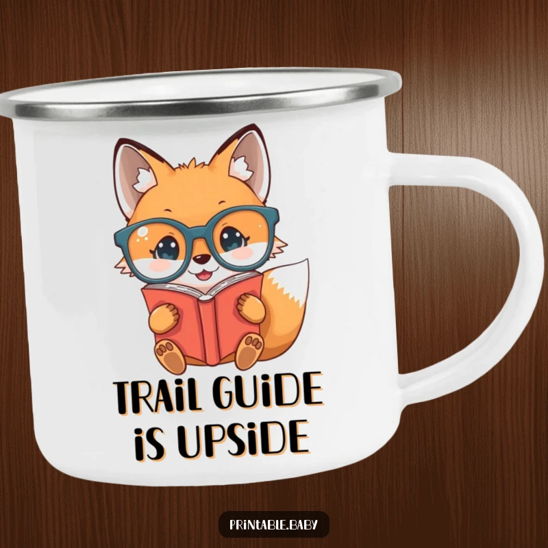 Funny baby fox with glasses reading a book upside down on a camping mug, great for outdoor humor.