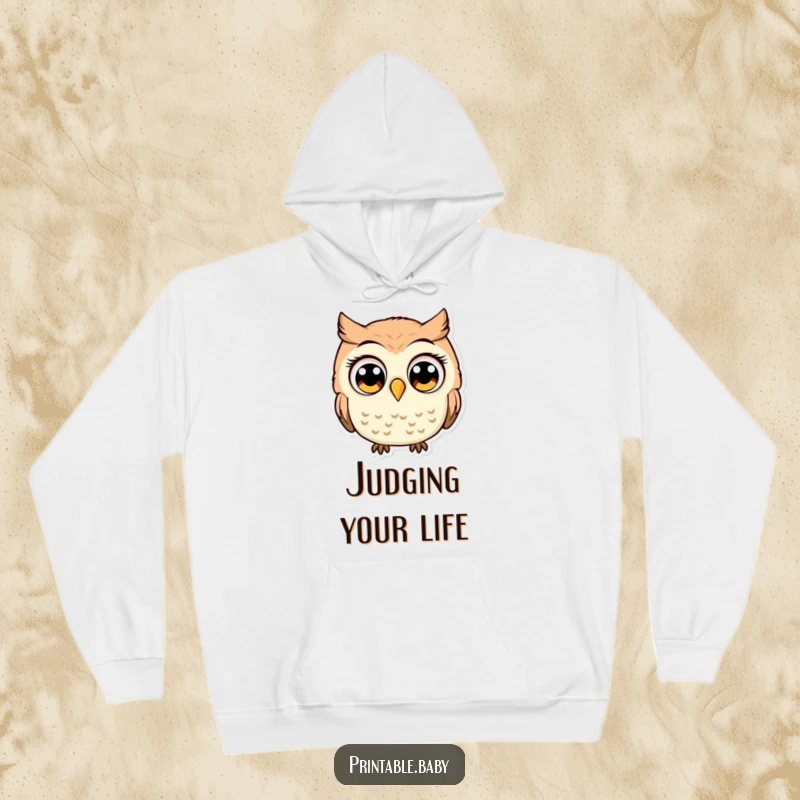 Funny owl with comically large, wide eyes, appearing shocked, a humorous hoodie for cozy, expressive warmth.