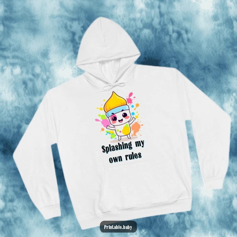 Funny Paintbrush Hoodie: Cozy hoodie featuring a mischievous paintbrush splashing vibrant colors with a smirk, ideal for art enthusiasts.