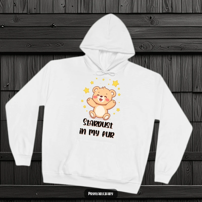 Funny teddy bear hoodie, a delighted bear catching sparkling falling stars, cozy and magical.
