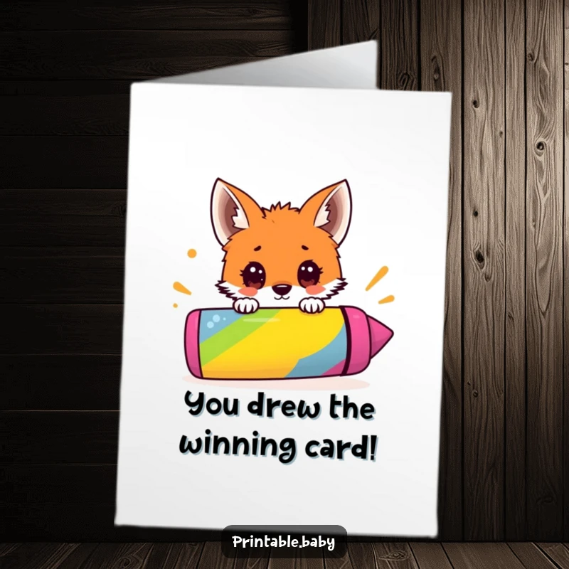 Free Printable Congratulations Card: Wide-eyed fox cub peeking over a massive colorful crayon, celebrating a creative accomplishment.